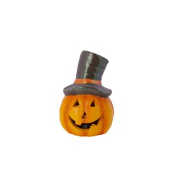 A cheerful orange pumpkin with a top hat and a wide, friendly grin.