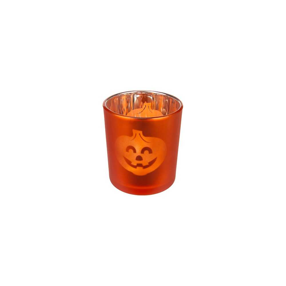 An orange glass candle holder with a smiling jack-o'-lantern design.