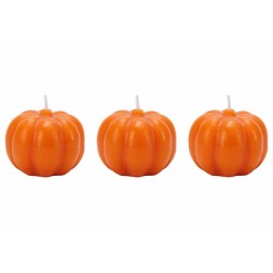 Three small, glossy orange pumpkin candles with ridged surfaces and white wicks.