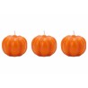 Three small, glossy orange pumpkin candles with ridged surfaces and white wicks.