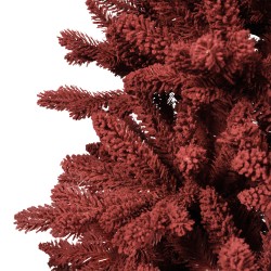 A close-up of a textured, deep red artificial tree branch.