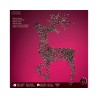 A decorative reindeer silhouette adorned with colorful lights against a vibrant pink background.