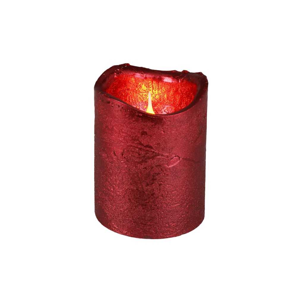 A deep red, textured candle with a flickering light at the top.