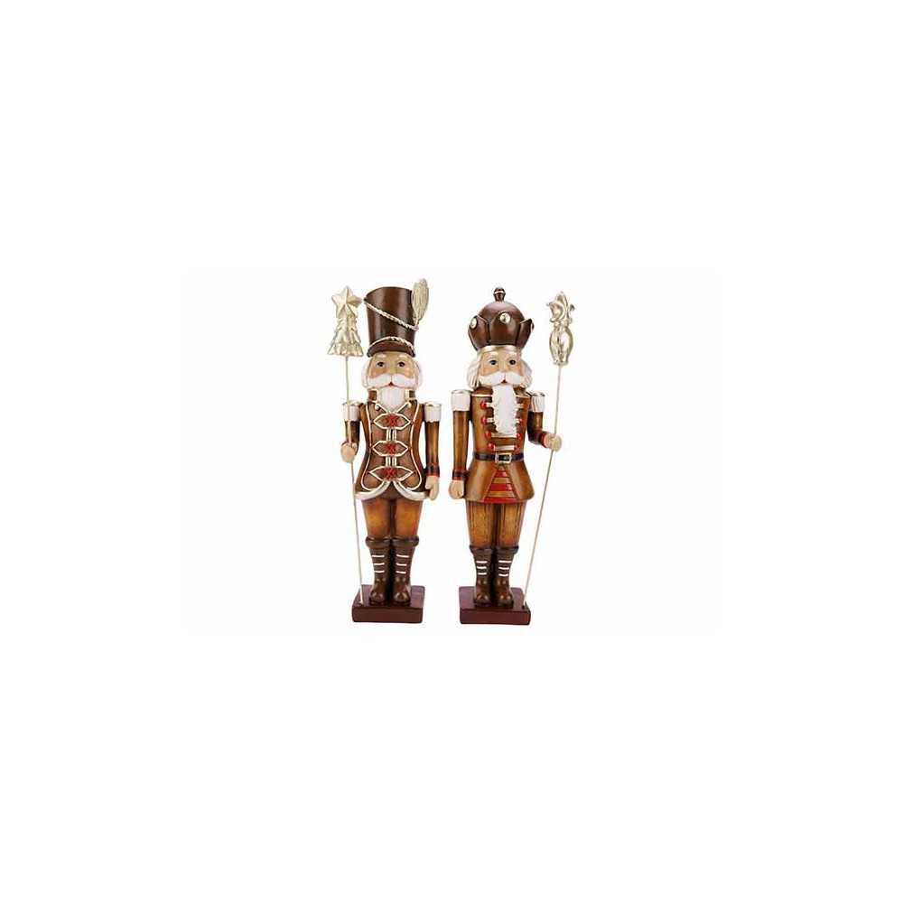 Two wooden nutcracker figures in festive attire, one with a tall hat and the other a crown.
