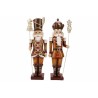 Two wooden nutcracker figures in festive attire, one with a tall hat and the other a crown.