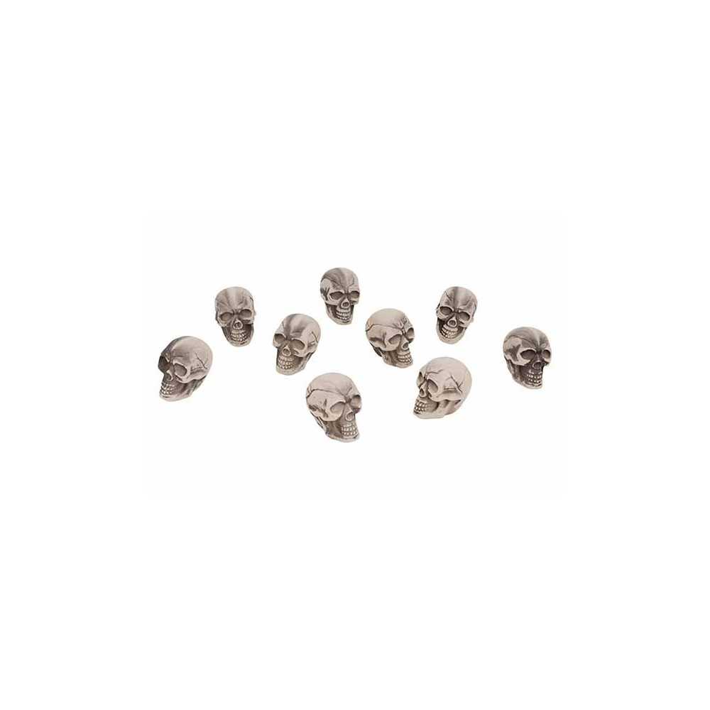 A collection of small, gray skulls with detailed features arranged in a scattered pattern.