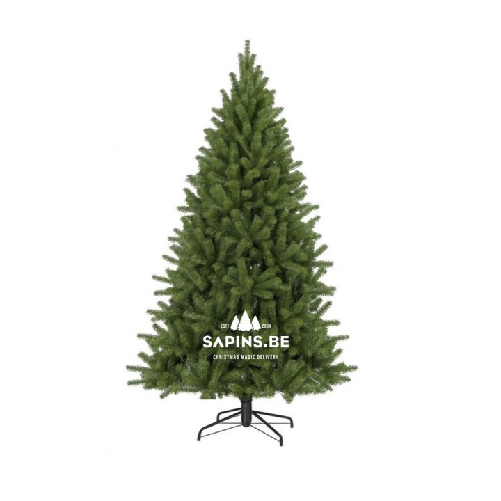 Groene kunststof kerstboom met volle takken, op een zwart metalen standaard, eenvoudig en stijlvol.