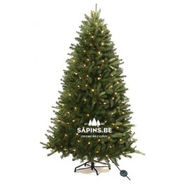 Groene kunstkerstboom met warme verlichting, op een stevige standaard, sfeervol en feestelijk.