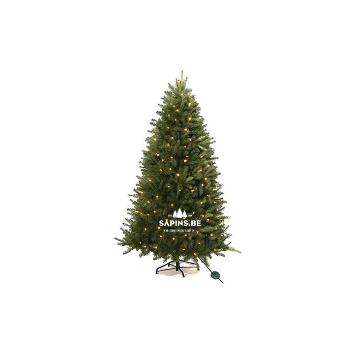 Groene kunstkerstboom met warme verlichting, op een stevige standaard, sfeervol en feestelijk.