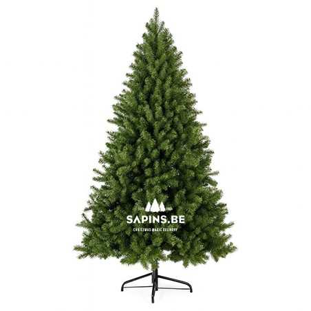 Groene kunstkerstboom met een volle, natuurlijke uitstraling en een zwarte metalen standaard.