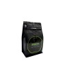 A sleek black coffee bag with a vibrant green label reading "Brazil."