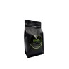 Black coffee bag with a green label reading "BRAZIL" and a sleek, modern design.