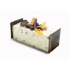 A rectangular cake topped with dark chocolate elements and orange accents on a white base.