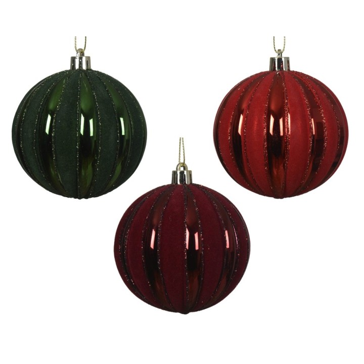 Three festive ornaments: deep green, rich red, and burgundy, with shiny, ribbed surfaces.