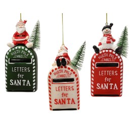 Three festive mailboxes for Santa, each topped with cheerful holiday figures and greenery.