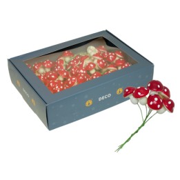 A box containing decorative red and white mushrooms with a whimsical, playful design.