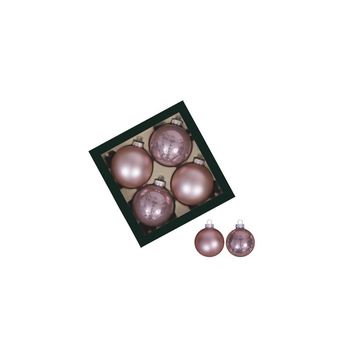 Four glossy pink ornaments in a dark green box, with two smaller matching ones beside.