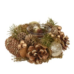 A festive arrangement featuring pinecones, gold ornaments, and a glass candle holder.
