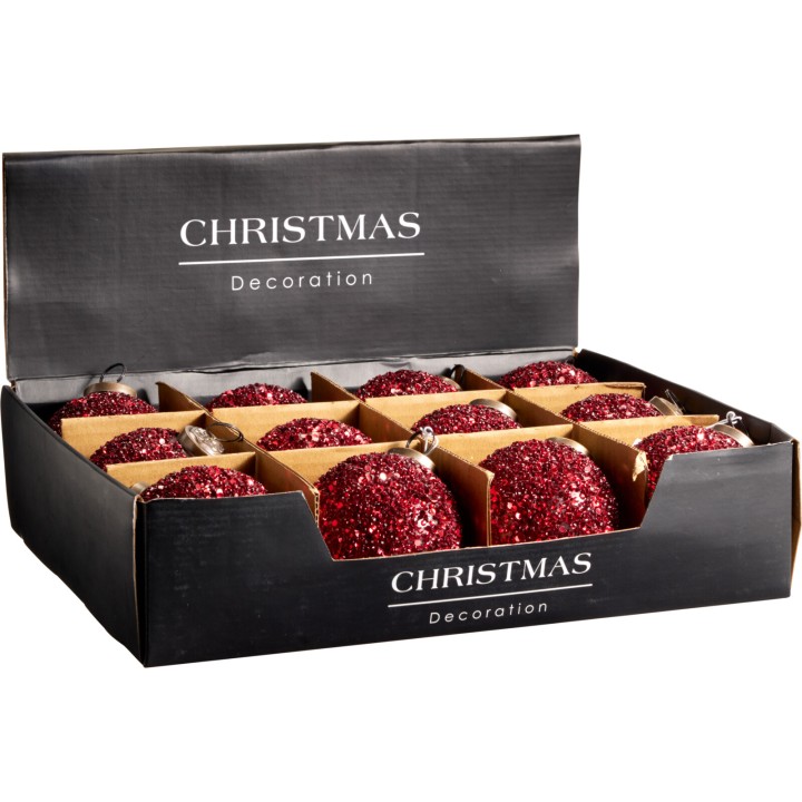 Een doos met twaalf glinsterende, rode kerstballen in verschillende maten.