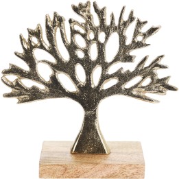 A decorative golden tree sculpture on a wooden base, featuring intricate cut-out branches.