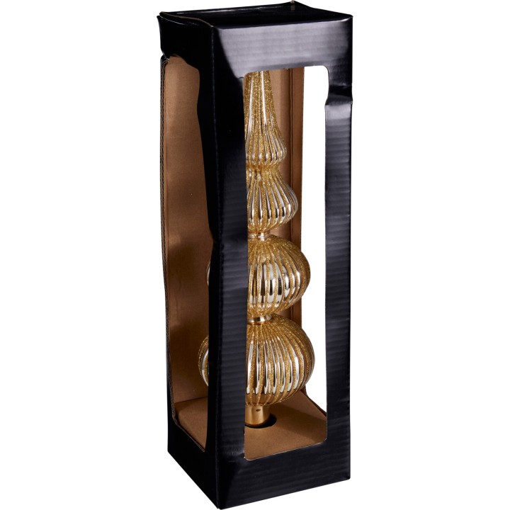 Verpakking met een elegante, gouden lamp in een zwarte doos met doorzichtig venster.