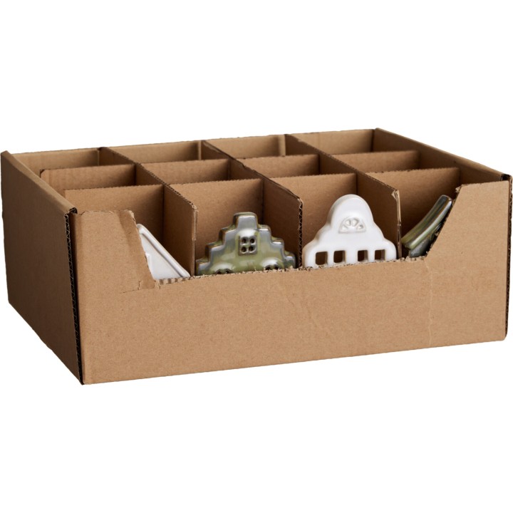 A cardboard box with compartments holding various decorative ceramic houses.