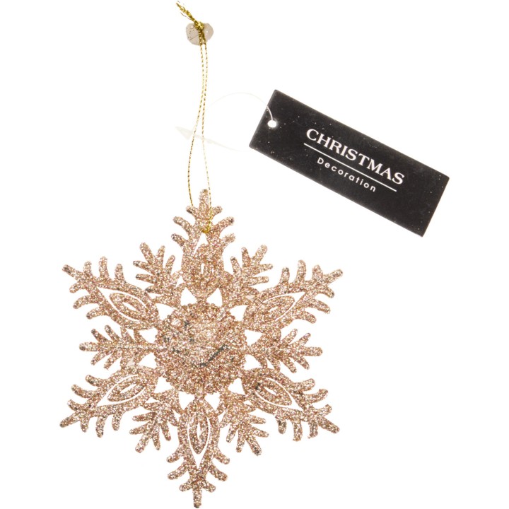 A shimmering gold snowflake ornament with intricate patterns and a delicate hanging string.