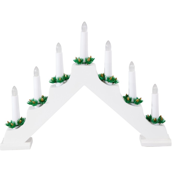 A white, arch-shaped candle holder with seven tall, slender candles and green accents.