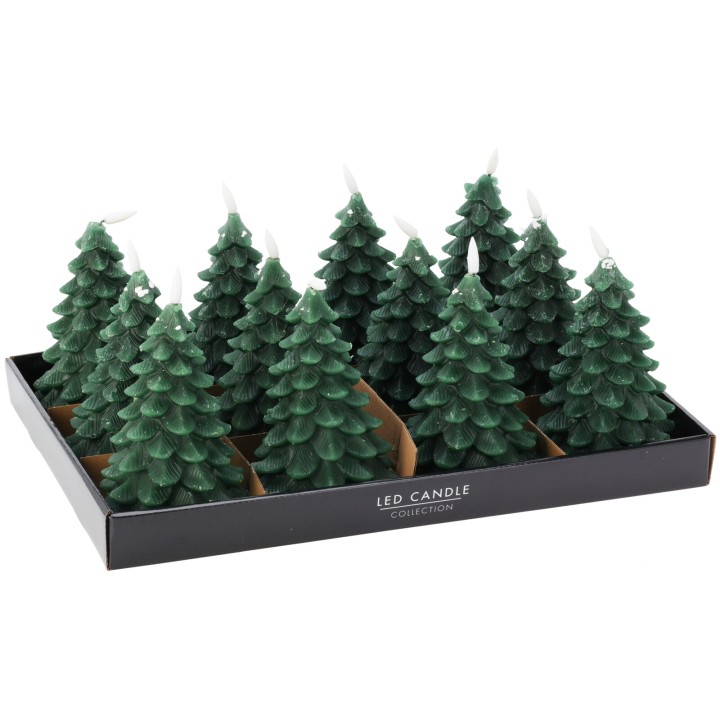 Groene kaarsen in de vorm van dennenbomen, gepresenteerd in een zwarte doos.