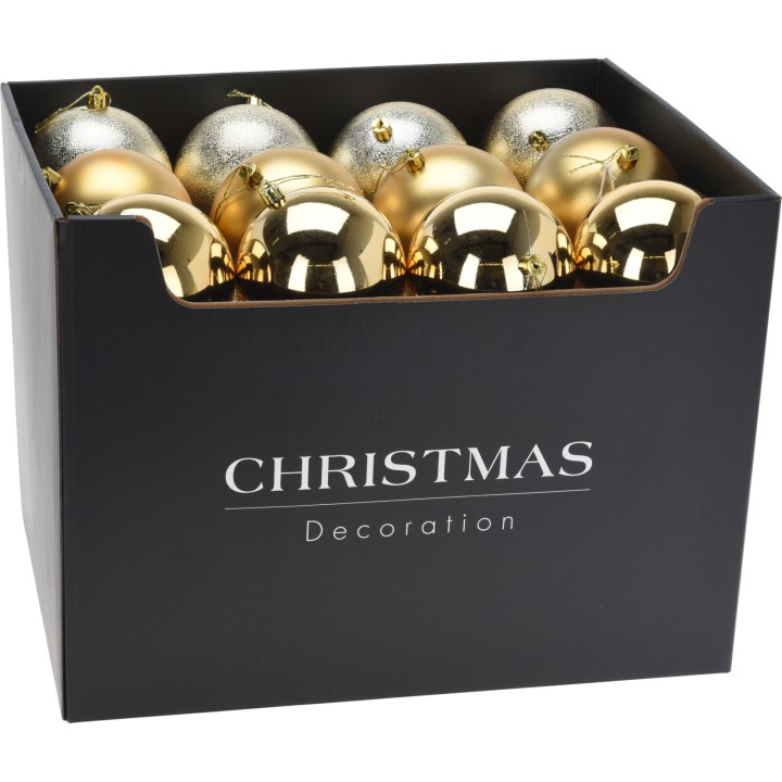 Zwarte doos met glanzende gouden en zilveren kerstballen erin.