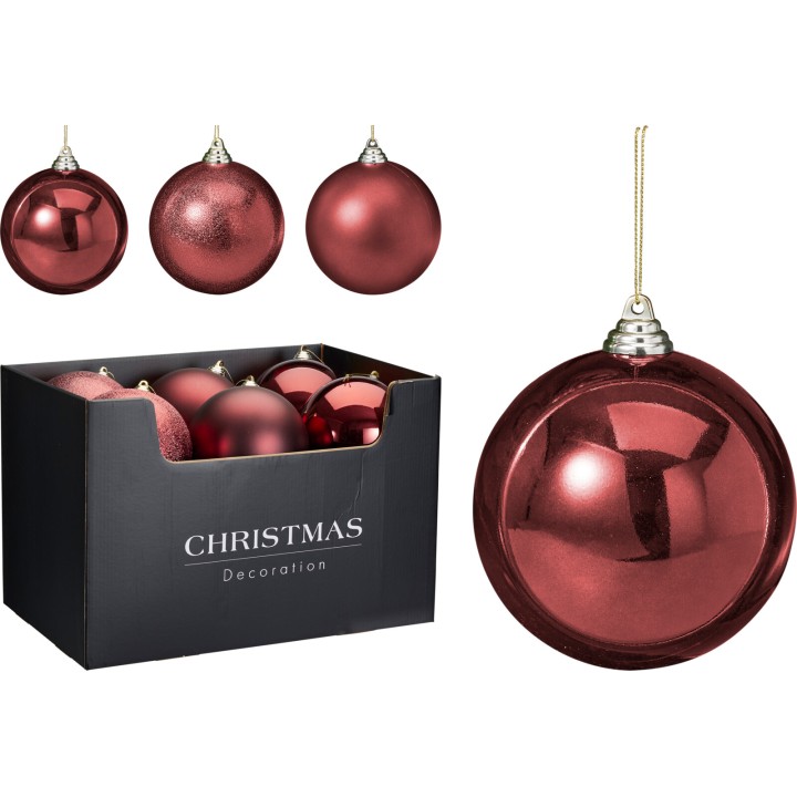 Shiny red Christmas ornaments in a black box, featuring various finishes and styles.
