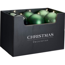 A black box filled with various green Christmas ornaments, some shiny and others sparkly.