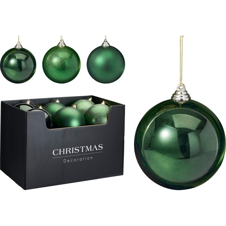 Shiny green Christmas ornaments in a black box, varying in texture and finish.