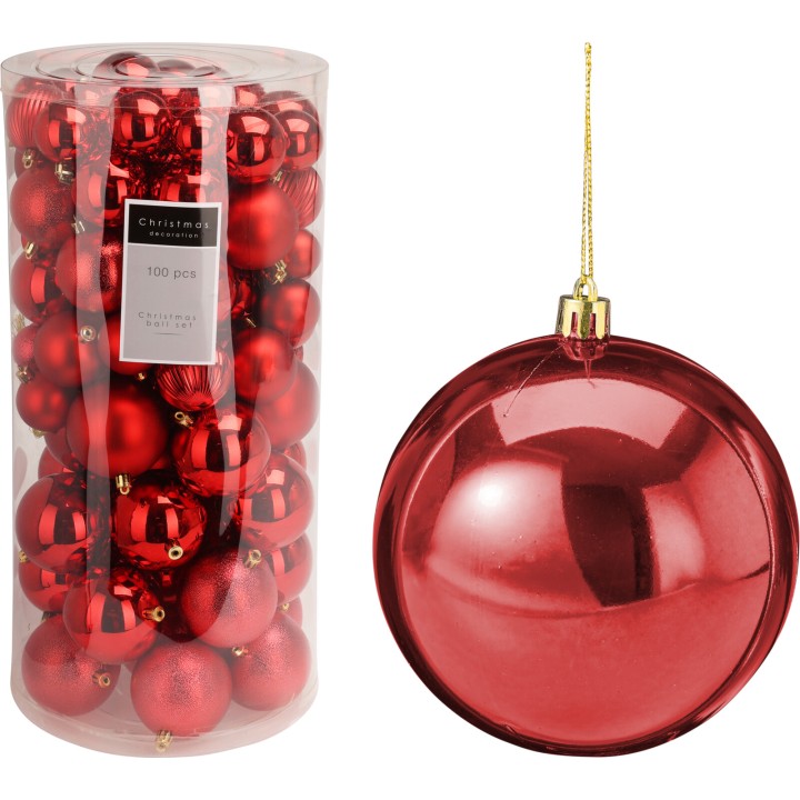 A clear container filled with shiny red Christmas ornaments, one displayed beside it.
