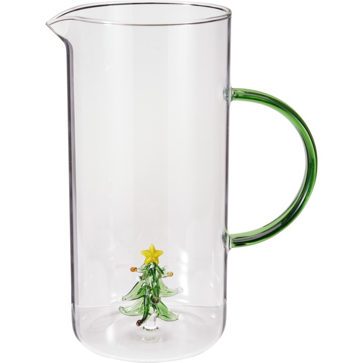 Clear glass pitcher with a green handle and a festive tree design inside.