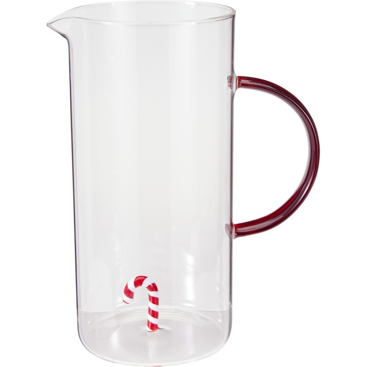 A clear pitcher with a red handle and a whimsical striped straw inside.