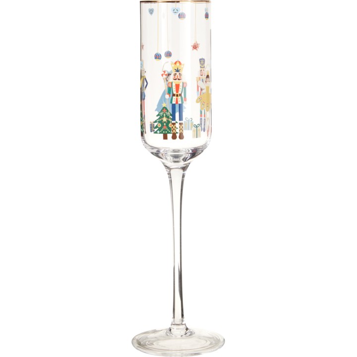 A tall, clear champagne flute adorned with colorful nutcracker and festive decorations.