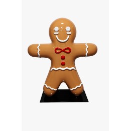 A playful, glossy gingerbread man figure with cheerful facial features and vibrant accents.