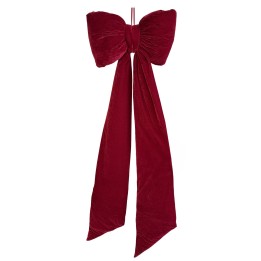A plush, deep red velvet bow with long, elegant tails hanging down.