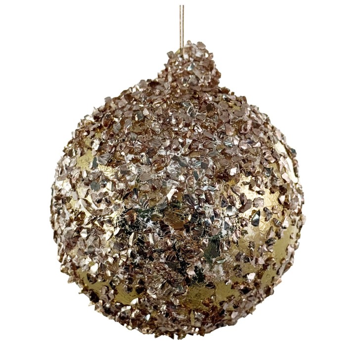 A shimmering gold and silver glittery ornament, round and textured, catches the light beautifully.