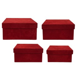 Four red velvet boxes of varying sizes, all with smooth, flat tops and elegant finishes.