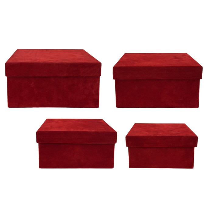 Four red velvet boxes of varying sizes, all with smooth, flat tops and elegant finishes.