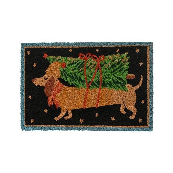 Een schattige teckel met een kerstboom op zijn rug, omringd door sterren op een donkere achtergrond.