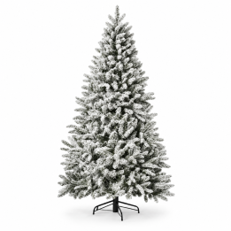 A tall, frosted artificial Christmas tree with a black metal stand.